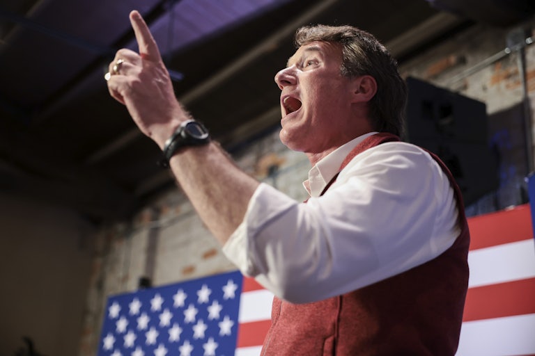 Virginia gubernatorial candidate Glenn Youngkin gestures at a rally.