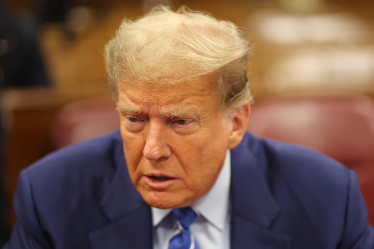 Donald Trump looks down