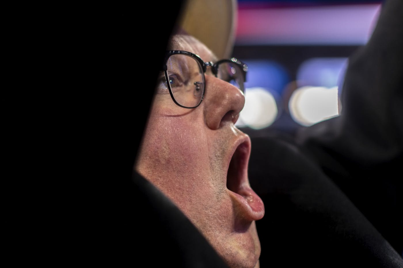 A photograph of an attendee yelling at the Republication National Convention 