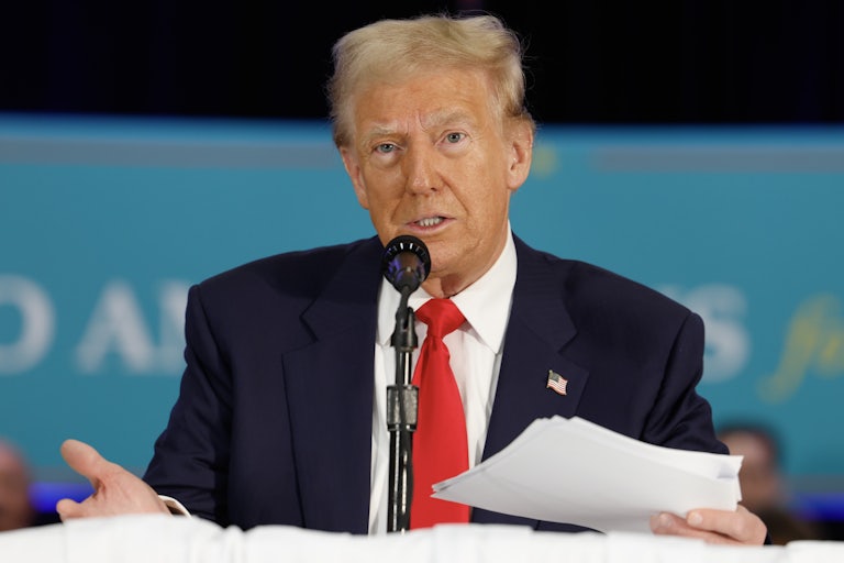 Donald Trump gestures while speaking at a Latino voters event