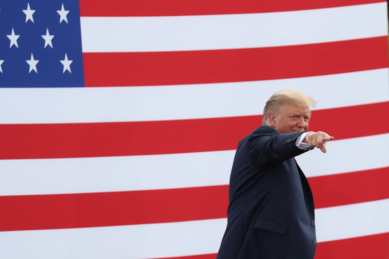 President Donald Trump gestures as he leaves after speaking about the environment in Florida.