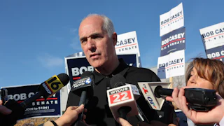 Pennsylvania Senator Bob Casey sp eaks ot the press