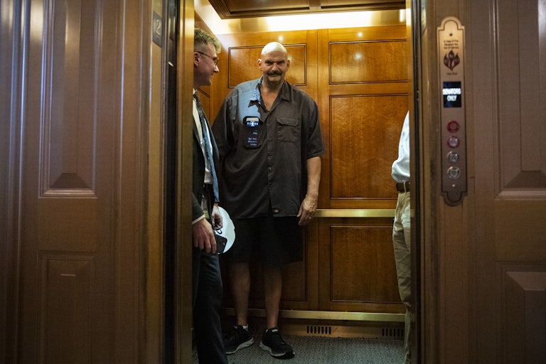 Pennsylvania Senator John Fetterman departs the weekly luncheon of Senate Democrats in an elevator.