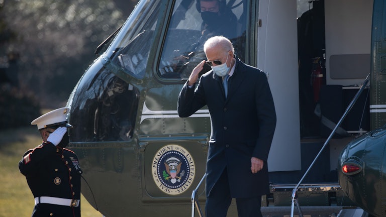 Biden exits the Marine One helicopter