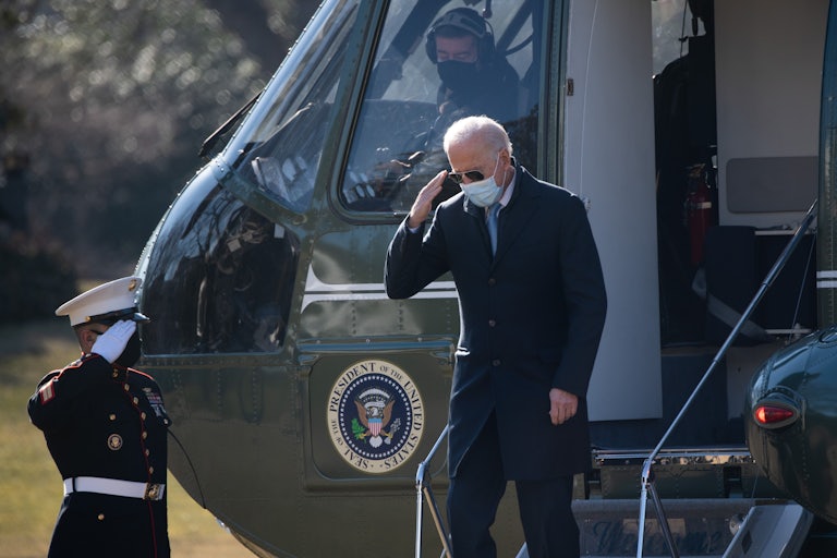 Biden exits the Marine One helicopter