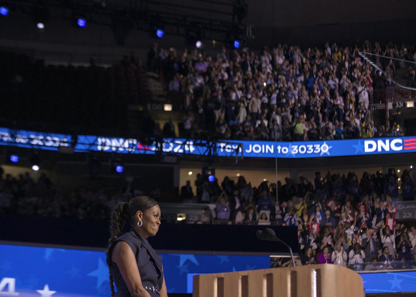 Michelle Obama arrives on stage 