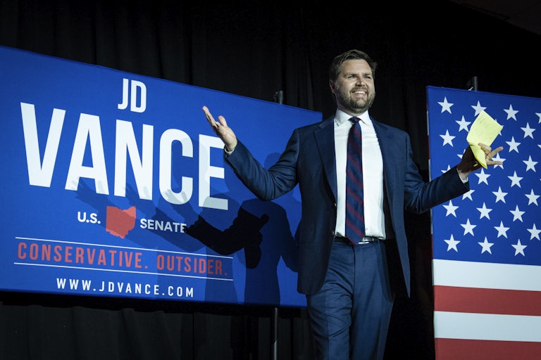 J.D. Vance celebrates after winning the Republican primary