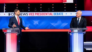 Vance speaks as Walz listens.