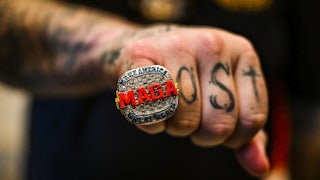 A supporter of former US President and 2024 presidential hopeful Donald Trump wears a MAGA ring as he attends a Super Tuesday election night watch party at Mar-a-Lago.