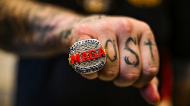 A supporter of former US President and 2024 presidential hopeful Donald Trump wears a MAGA ring as he attends a Super Tuesday election night watch party at Mar-a-Lago.