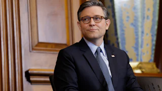 Mike Johnson looks to the side