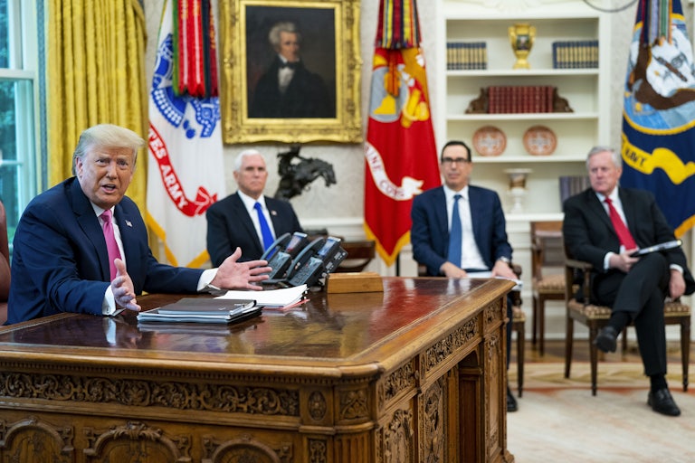 Trump in the Oval Office with (l-r) Mike Pence, Steven Mnuchin, and Mark Meadows
