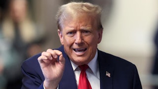 Donald Trump gestures while he speaks