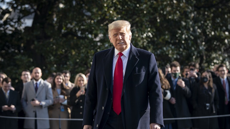Donald Trump speaks to reporters at the White House.