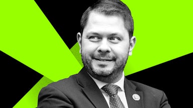 Arizona congressman Ruben Gallego in front of a green and black background