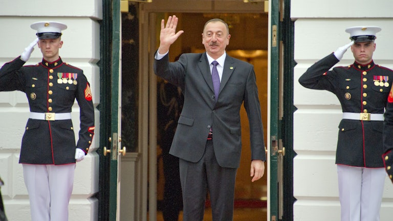 Azeri president Ilham Aliyev waves as he exits the White House in 2016.