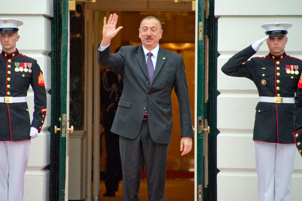 Azeri president Ilham Aliyev waves as he exits the White House in 2016.
