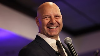A close-up of a smiling GOP gubernatorial candidate Doug Mastriano.
