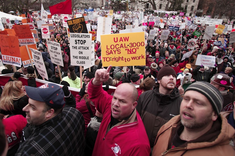 Union members protesting a vote on right-to-work legislation