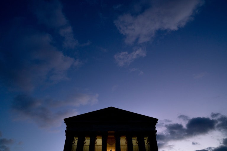 Clouds are seen in the sky above the US Supreme Court at dusk in Washington, DC