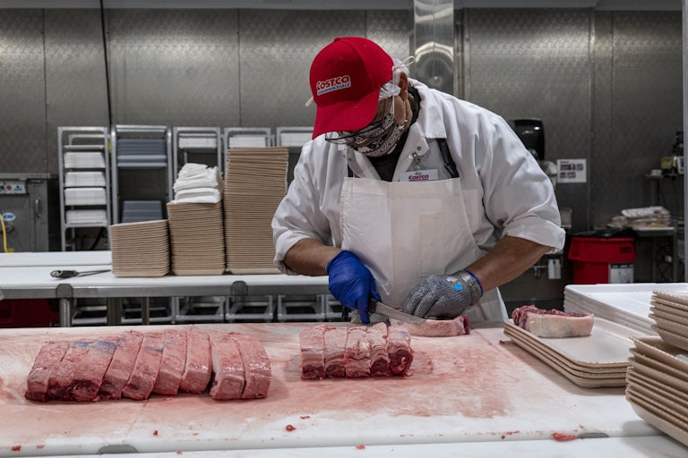 A butcher at a Costco store in San Francisco, California