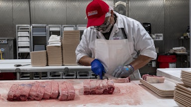 A butcher at a Costco store in San Francisco, California