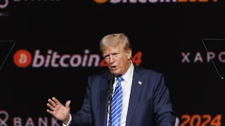 Donald Trump gestures while speaking at the annual Bitcoin conference