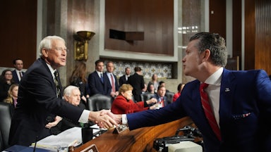 President-elect Donald Trump's nominee for Secretary of Defense Pete Hegseth greets Senate Armed Services Committee Chairman Sen. Roger Wicker during his confirmation hearing on Capitol Hill on January 14, 2025.