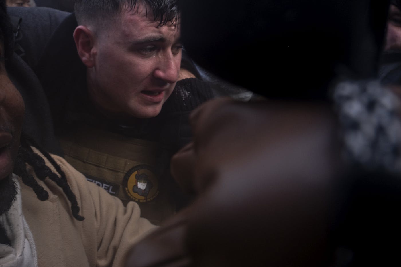 Jake Lang, left, organized an anti-Islam, anti-Somali, and pro-ICE demonstration in downtown Minneapolis Saturday January 17th and is shown being confronted by counterprotesters.