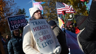 Transgender rights supporters rally outside of the U.S. Supreme Court as the high court hears arguments in a case on transgender health rights in Washington, D.C.