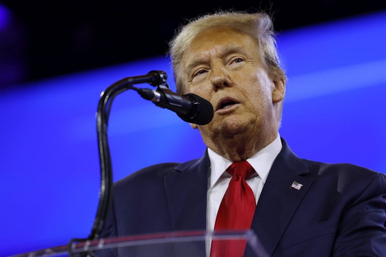 Donald Trump speaks at a mic