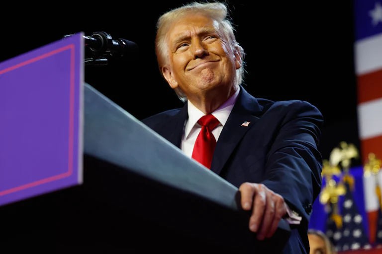 Donald Trump arrives to speak during an election night event at the Palm Beach Convention Center.