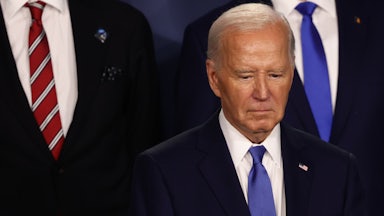 Joe Biden looks down