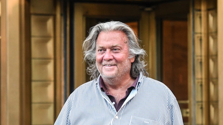 Steve Bannon smiles.