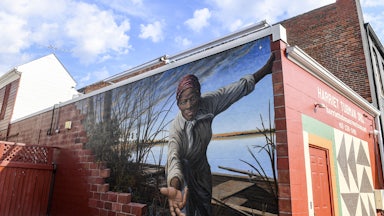 The mural,“Take My Hand,” painted by artist Michael Rosato, at the The Harriet Tubman Museum & Educational Center in Cambridge, Maryland