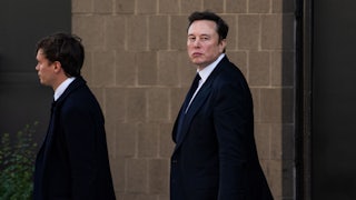 Elon Musk walking outside