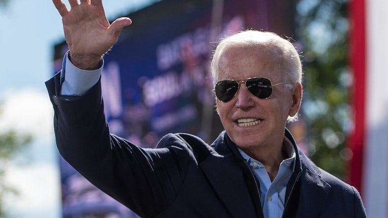 Joe Biden smiles at a campaign event