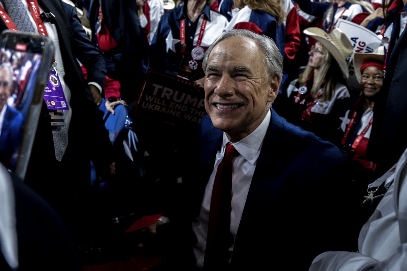 A photograph of Texas Governor Greg Abbott on stage at the Republication National Convention 