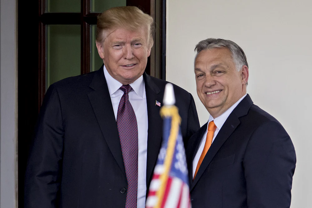 Donald Trump and Viktor Orban stand for photographers at the West Wing of the White House in 2019.