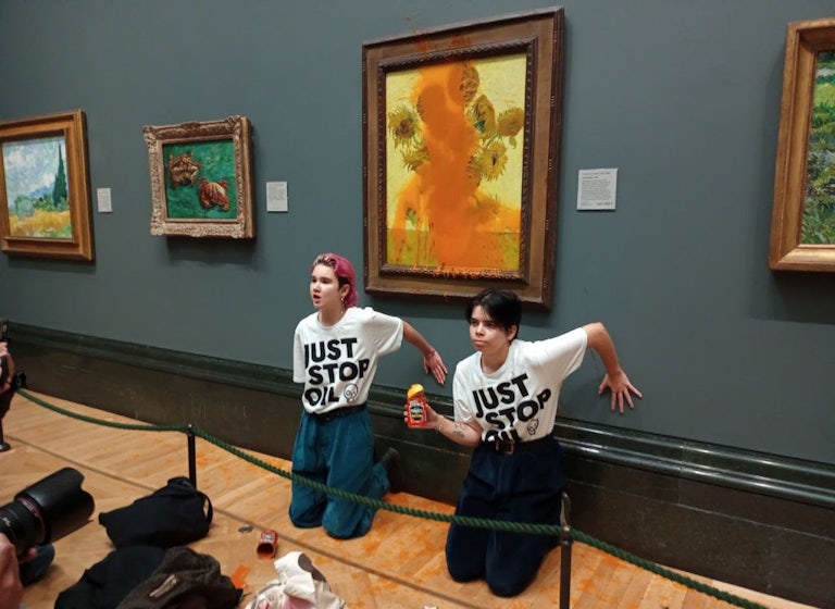 Just Stop Oil protesters throw soup on at Vincent van Gogh’s “Sunflowers.”