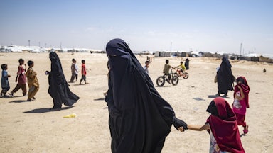 Women and children at the Al Hol refugee camp in Syria in 2023, where the Kurdish-led Syrian Democratic Forces hold spouses and children of fighters who volunteered to join ISIL