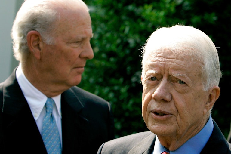 Former President Jimmy Carter (R) and former Secretary of State James Baker at the White House in 2005.