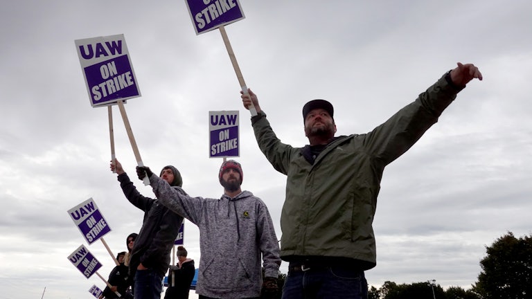 Striking workers picket outside of the John Deere Davenport Works facility on October 15, 2021 in Davenport, Iowa.