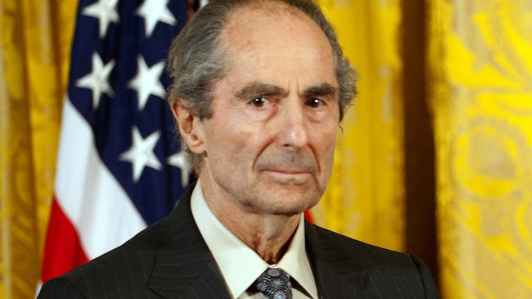 Author Philip Roth stands during an awards ceremony at the White House.