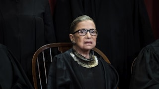 A close-up of Justice Ruth Bader Ginsburg, posing for her official Supreme Court portrait.