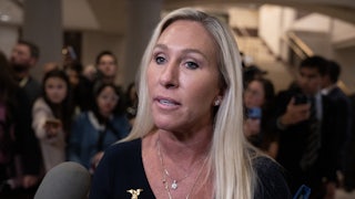 Marjorie Taylor Greene speaks to reporters