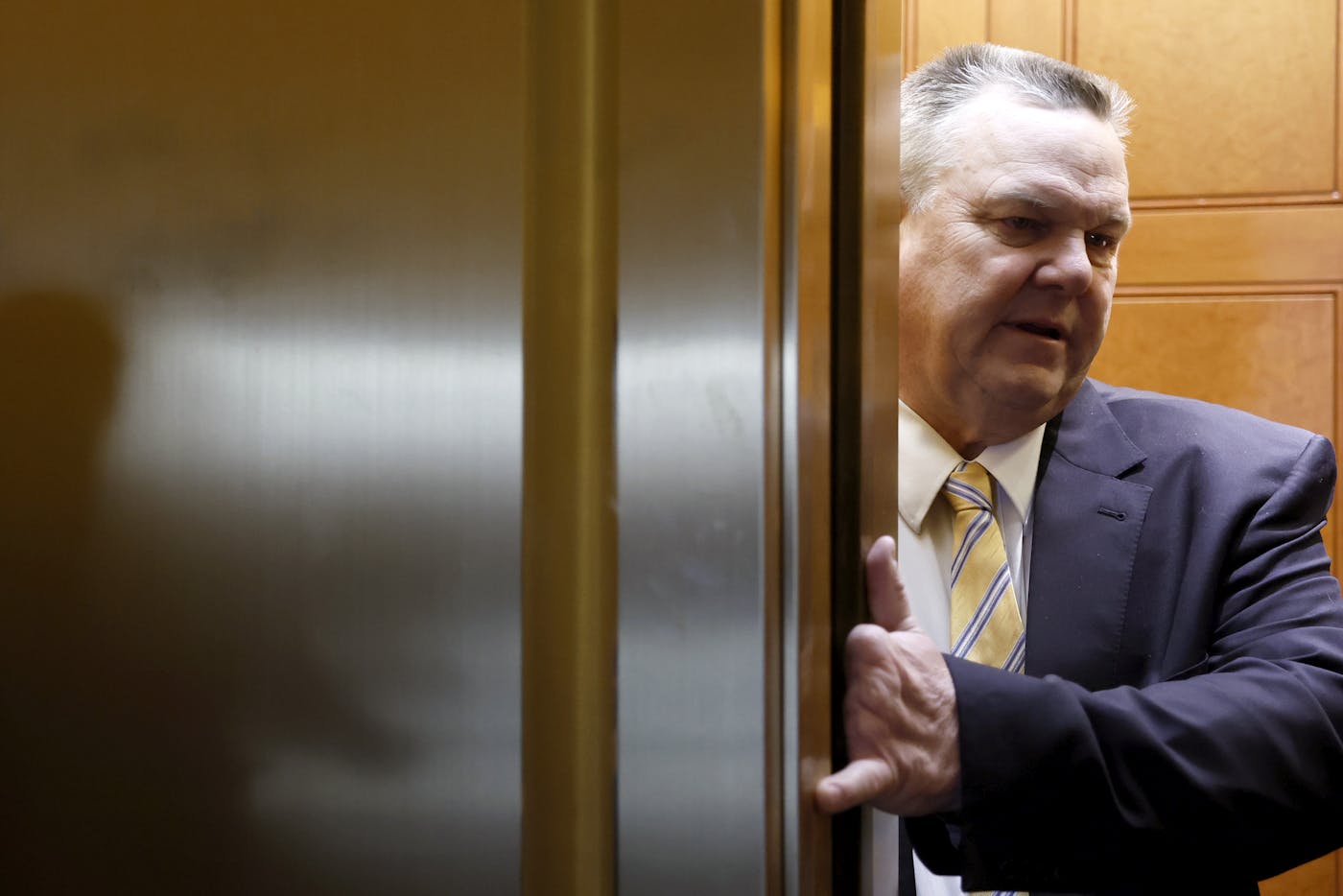 Senator Jon Tester spoke to reporters in February 2024.