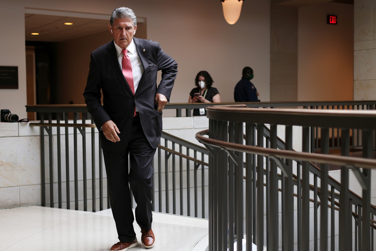 Joe Manchin reaches into his pocket.