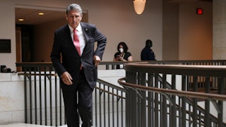 Joe Manchin reaches into his pocket.