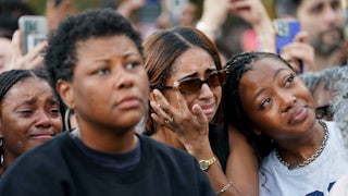 Attendees react as Kamala Harris speaks at Howard University after conceding the election.